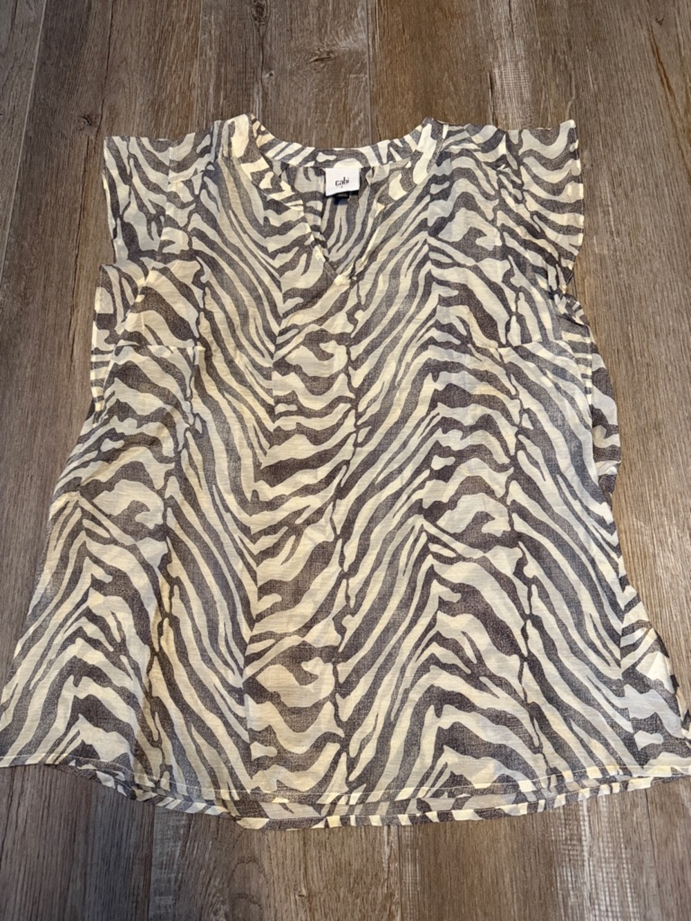 CAbi Savanna Top featuring a grey and cream zebra print